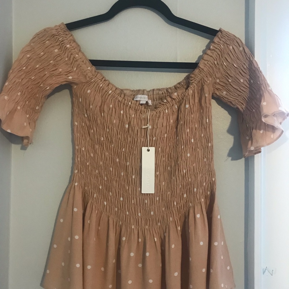 Never worn Olivaceous top, size large.